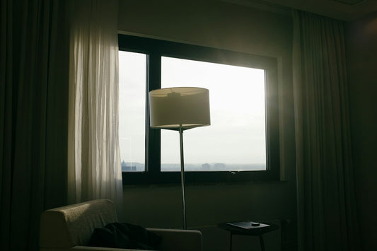 How a Moon Floor Lamp Softens Harsh Lighting in a Small Bedroom
