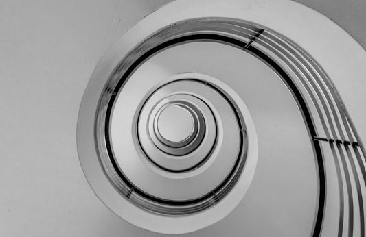 Small Entryway Feeling Flat? Style It with a Spiral Mirror for Instant Depth and Character