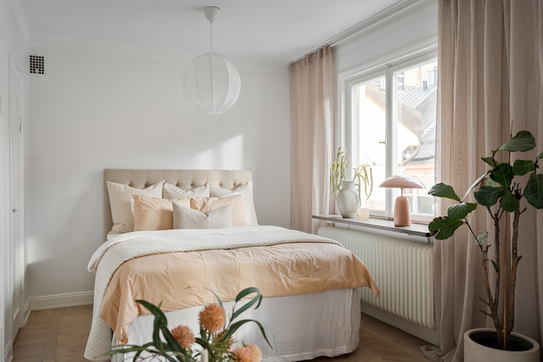 Curtains vs Blinds for Small Bedrooms: Which Window Treatment Makes Your Room Feel Bigger?