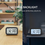 DOOMAY Digital Alarm Clock Bedside - Battery Powered Clock with LCD Display Volume Adjustable Snooze and Weekend Mode for Bedroom Office Desk Travel - Black
