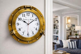 Franklin Murphy's Analog Beautiful Nautical Porthole Wall Clock, Antique Brass Finish, 12" Aluminum with Glass Face, Maritime Decor, Battery Operated Home Decor