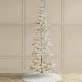 Glitzhome 9ft Pre-Lit Flocked Slim Artificial Christmas Tree with 650 Warm White LEDs, Realistic PE Needles Hinged Design for Modern Home Holiday Decor