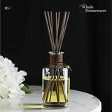 WHOLE HOUSEWARES Set of 4 Diffuser Bottles with Sticks - 7.5oz Empty Glass Diffuser Bottle for Essential Oils - Oil Diffusers Container with 32pcs Reed Sticks for Aromatherapy and Home Fragrance