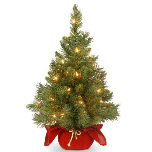 National Tree Company 24 in Pre-Lit Majestic Fir Mini Artificial Christmas Tree, 35 Clear Lights, 71 Tips, Red Cloth Base, Green