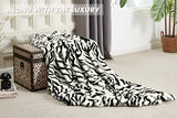 JONIYEAR Soft Fluffy Zebra Print Faux Rabbit Fur Throw Blanket 50" x 60", Luxury Cozy Shaggy Fuzzy Blankets, Reversible Cute Warm Animal Printed Blanket for Women Winter,Washable,Cream White and Black
